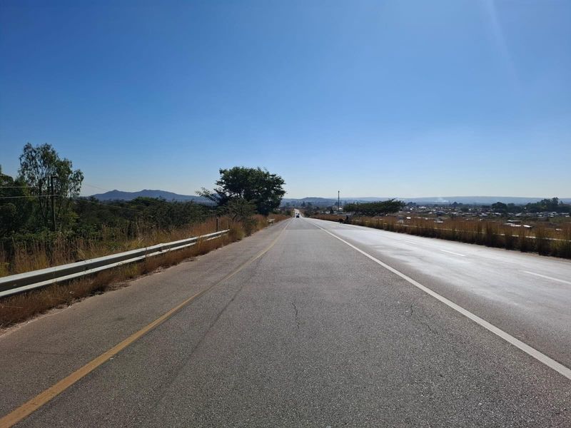 A view of the paved road infrastructure providing access to the surrounding commercial land area.