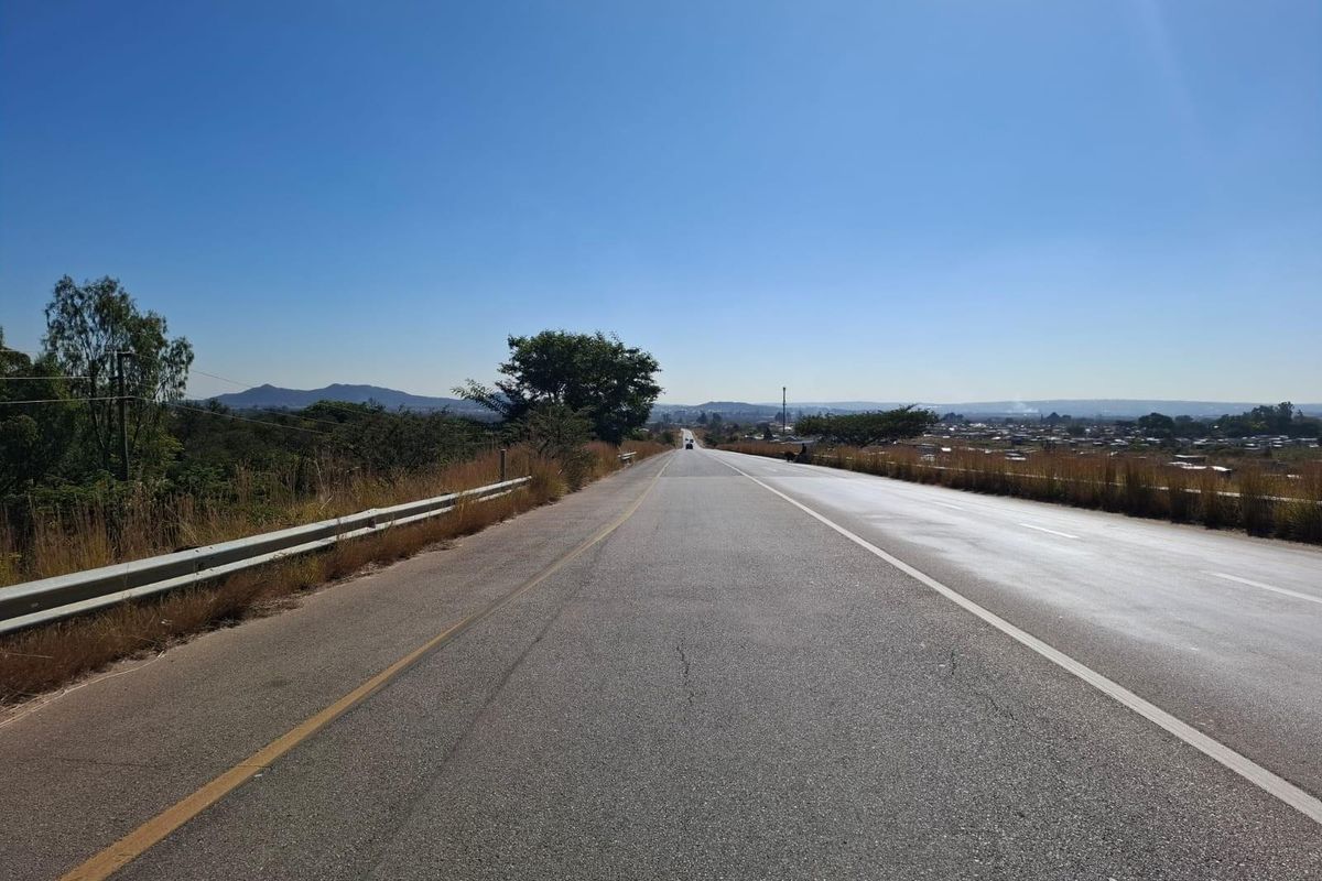 A view of the paved road infrastructure providing access to the surrounding commercial land area.