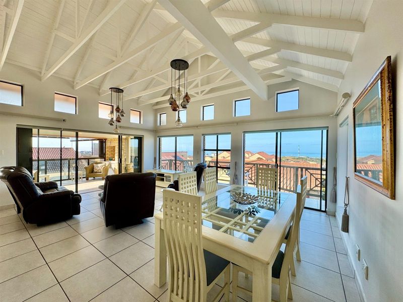 Elegant Facebrick Home with Breathtaking Mountain and Ocean Views In A Security Complex - Photo 5