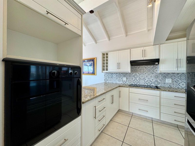 Elegant Facebrick Home with Breathtaking Mountain and Ocean Views In A Security Complex - Photo 10