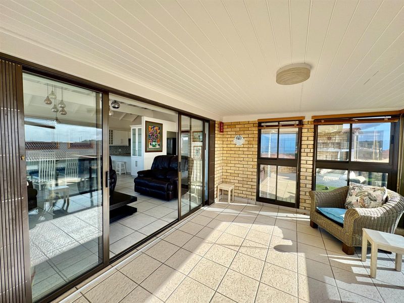 Elegant Facebrick Home with Breathtaking Mountain and Ocean Views In A Security Complex - Photo 7