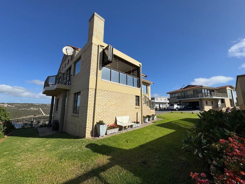 Elegant Facebrick Home with Breathtaking Mountain and Ocean Views In A Security Complex - Photo 6