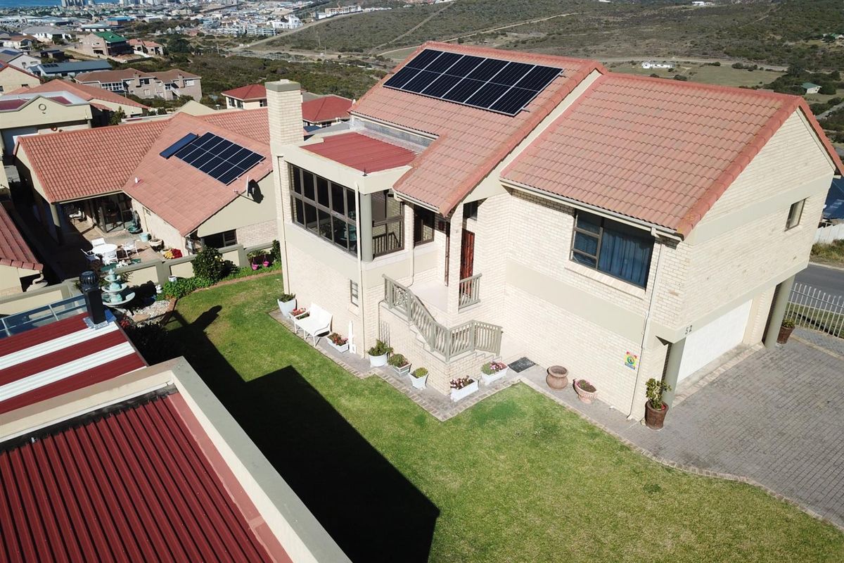 Elegant Facebrick Home with Breathtaking Mountain and Ocean Views In A Security Complex - Photo 2