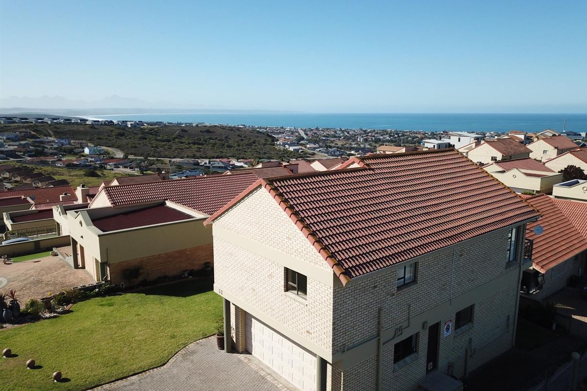 Elegant Facebrick Home with Breathtaking Mountain and Ocean Views In A Security Complex - Photo 4