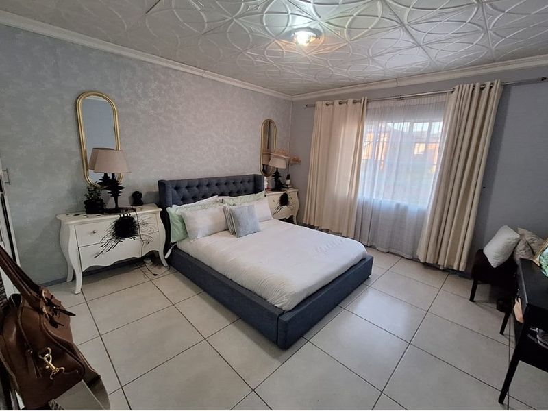 Secure, Stylish Gem with Perks Awaiting New Family - Photo 2