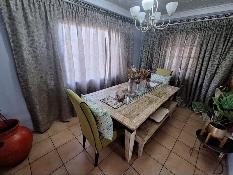 Secure, Stylish Gem with Perks Awaiting New Family - Photo 3