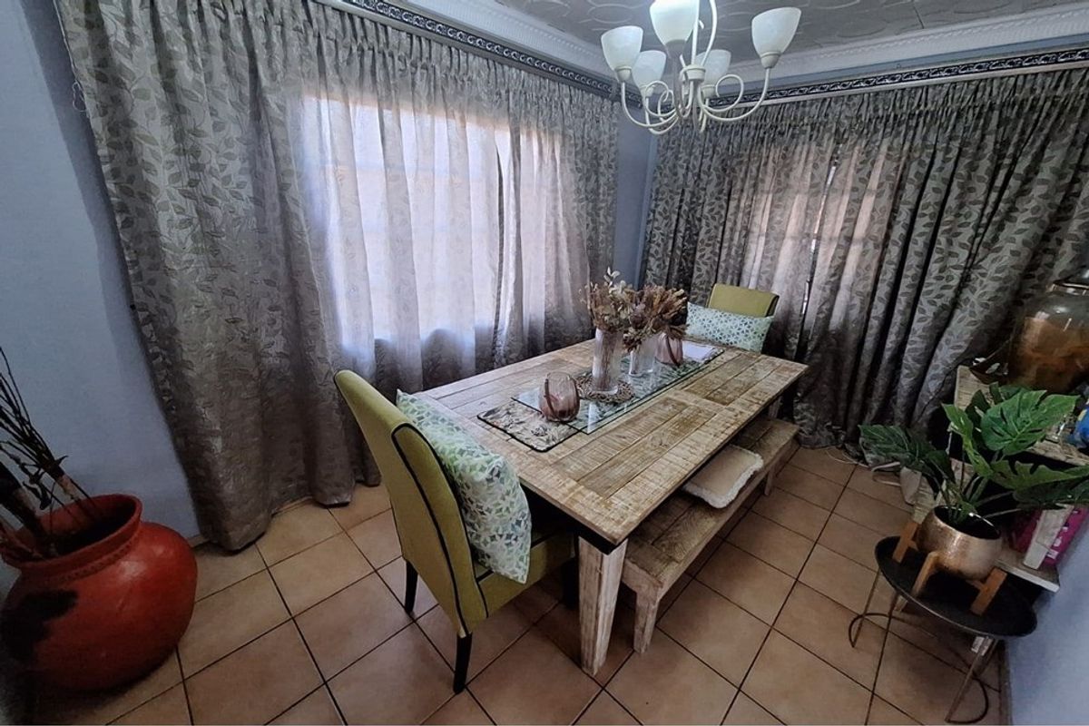 Secure, Stylish Gem with Perks Awaiting New Family - Photo 3