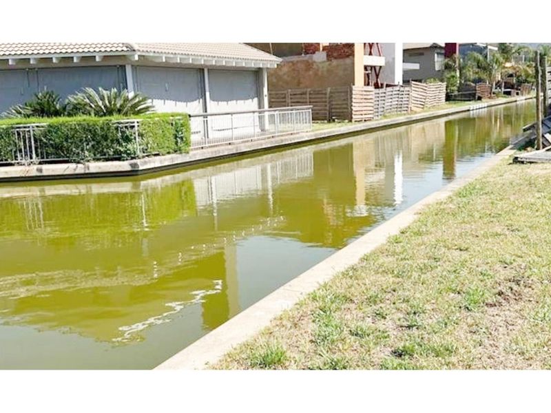Blend of convenience and nature for those seeking a waterfront lifestyle! - Photo 2