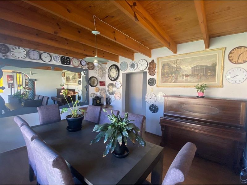 Charming Four-Bedroom Family Home with Entertainment Features - Photo 6