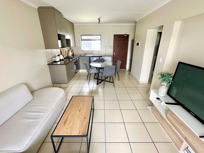 Modern 1-Bedroom Apartment with Open Balcony and Communal Pool in Barbeque Downs - Photo 9