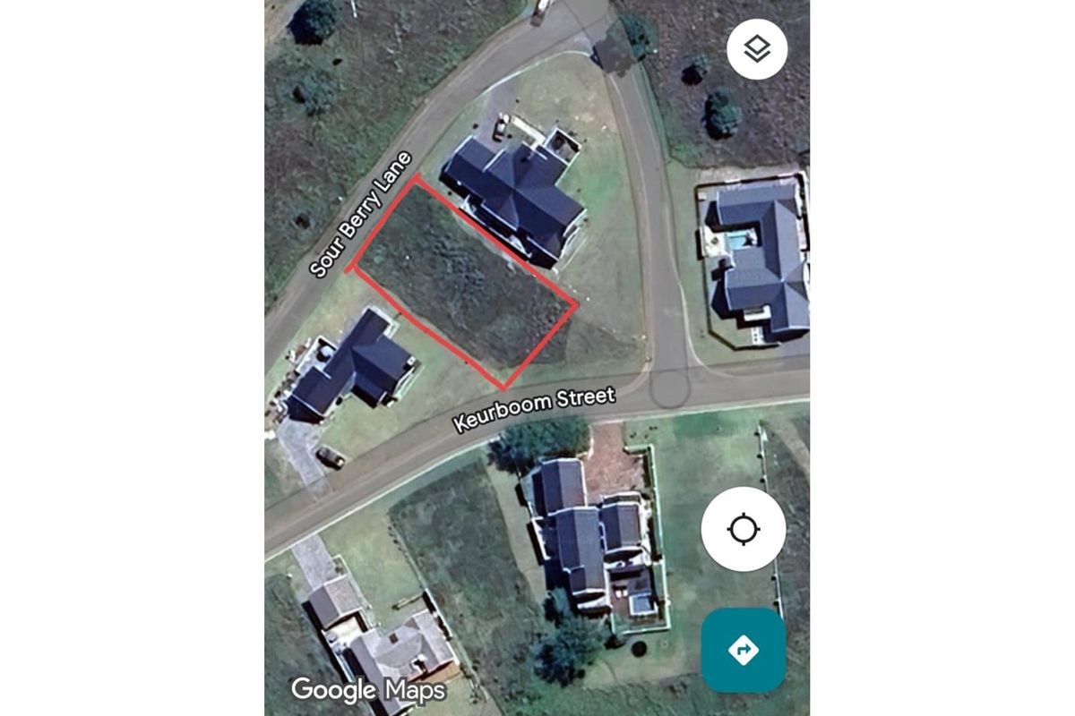 An aerial view of a vacant residential corner plot located at the intersection of Sour Berry Lane and Keurboom Street.