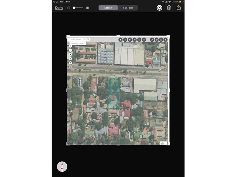 An aerial view showing the property location and surrounding neighborhood context.
