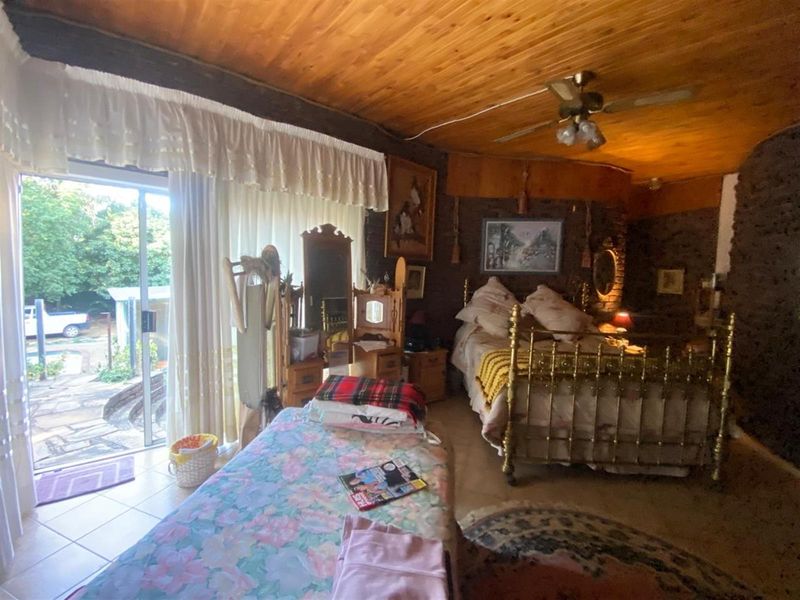 Renovator’s Dream - Spacious 4-Bedroom Home with Endless Possibilities - Photo 2