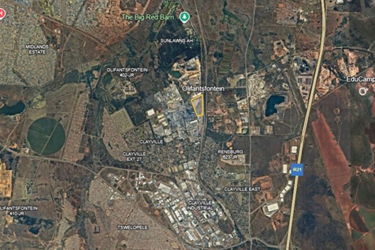 An aerial satellite view showing the location of the industrial property within the Olifantsfontein area, highlighting its proximity to major transport routes.