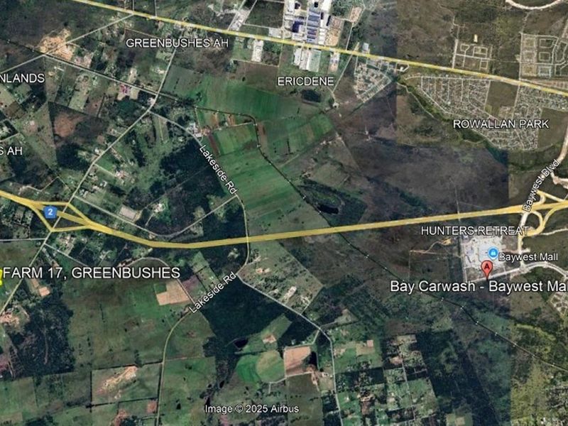 An aerial satellite map view showing the location of the farm property in relation to surrounding suburbs and major road infrastructure.