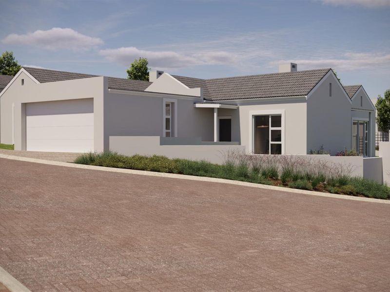 A modern single-story residential house featuring a tiled roof, integrated garage, and a clean paved driveway entrance.