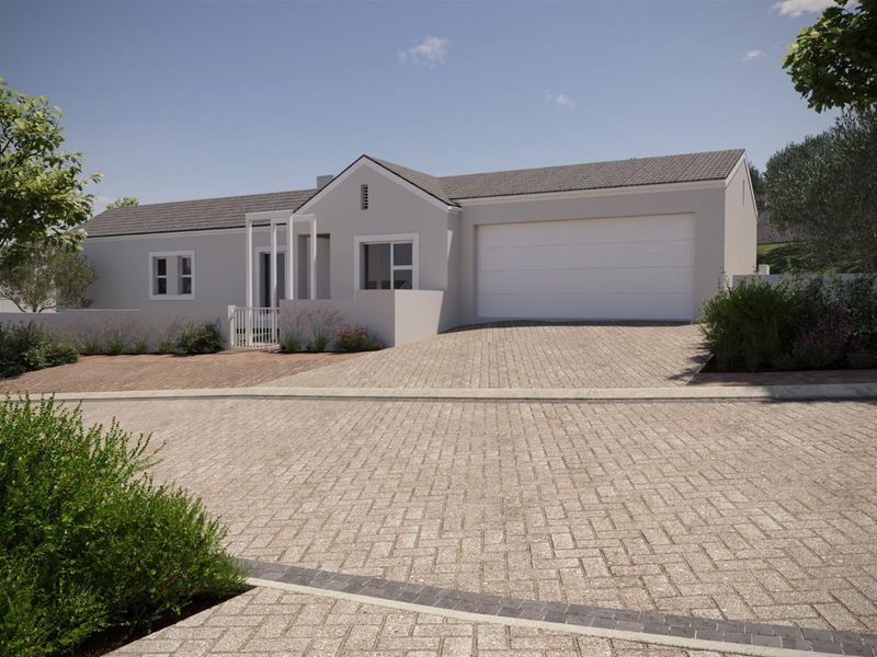 A modern single-story residential property featuring a paved driveway, integrated garage, and clean architectural lines.