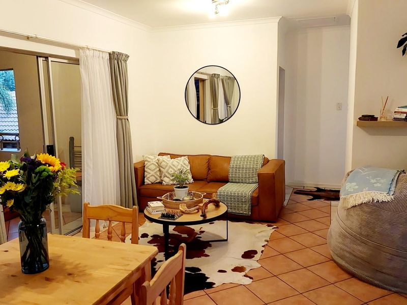 Rare Find: 2 Bedroom, 2 Bathroom, Double Garage Unit in Olympus/Boardwalk for Sale - Photo 2