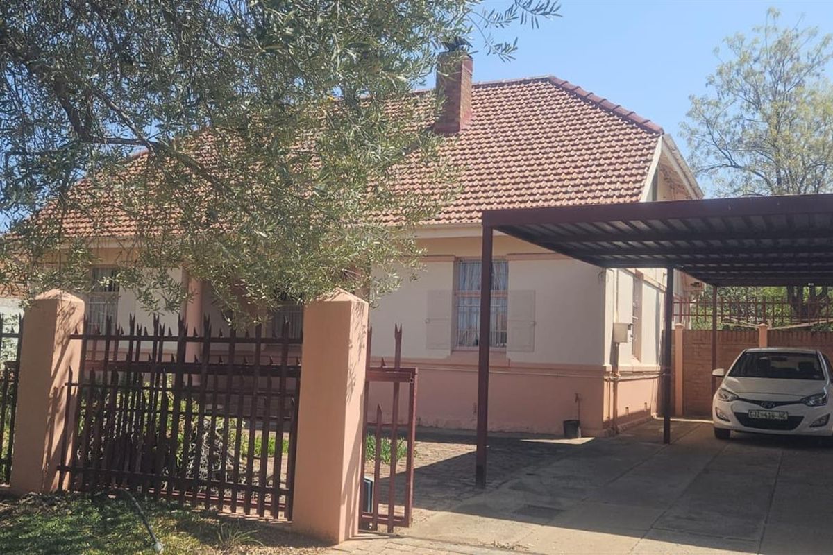 This delightful home offers a blend of comfort, charm, and practical living spaces-perfect for famil - Photo 2