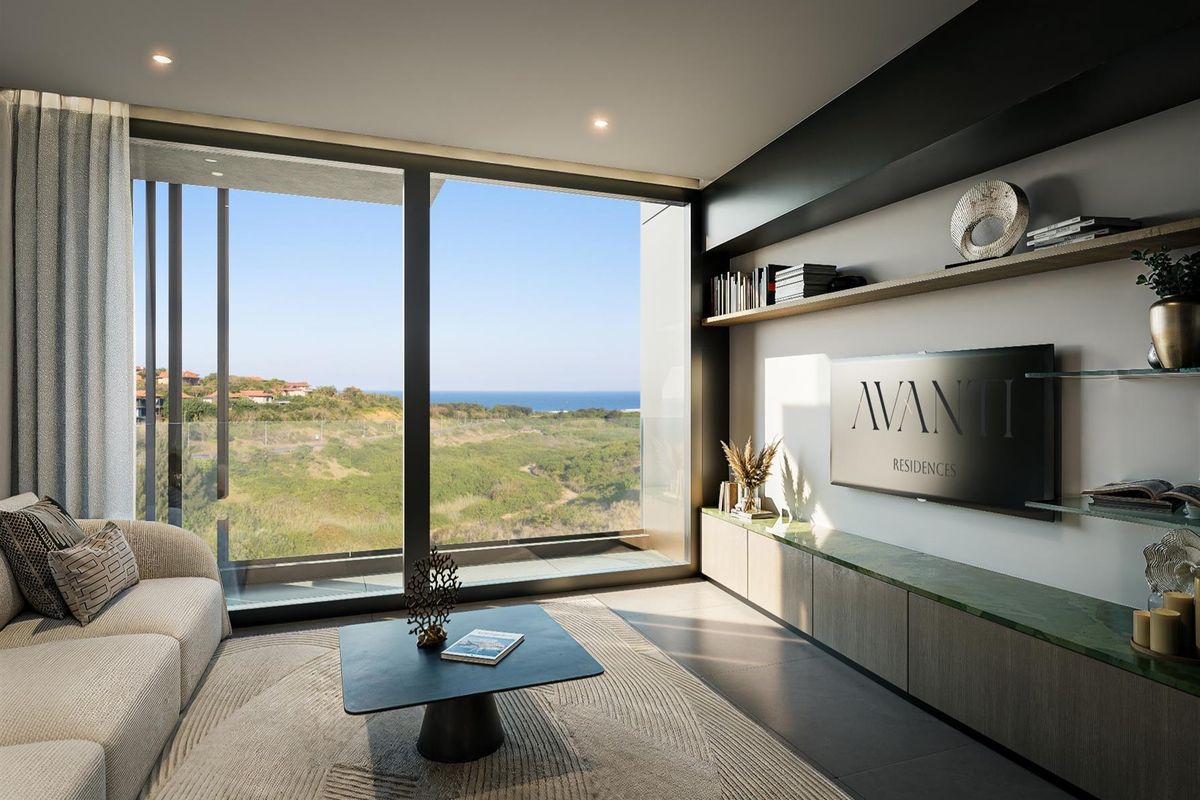 Modern living room featuring floor-to-ceiling windows with expansive coastal views, custom built-in cabinetry, and integrated shelving.