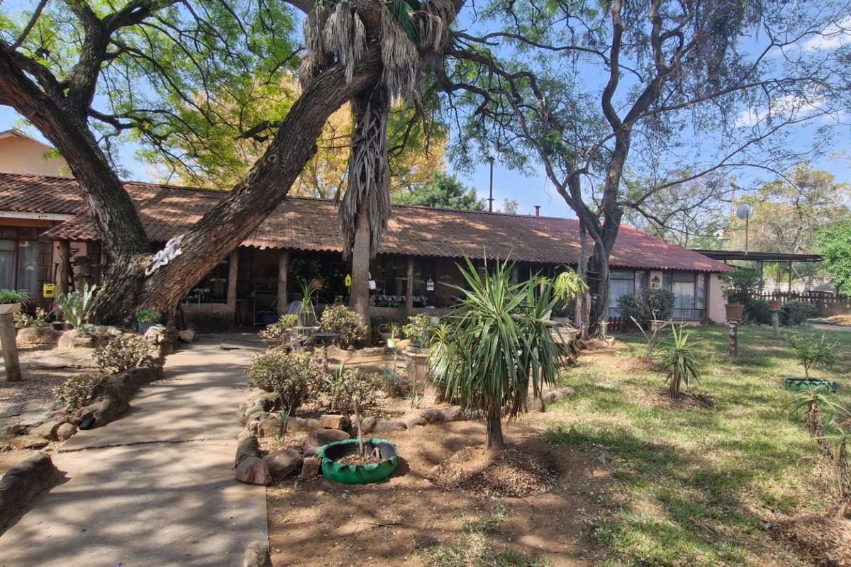 PRICED TO GO FIXER-UPPER WITH GREAT POTENTIAL - Photo 2