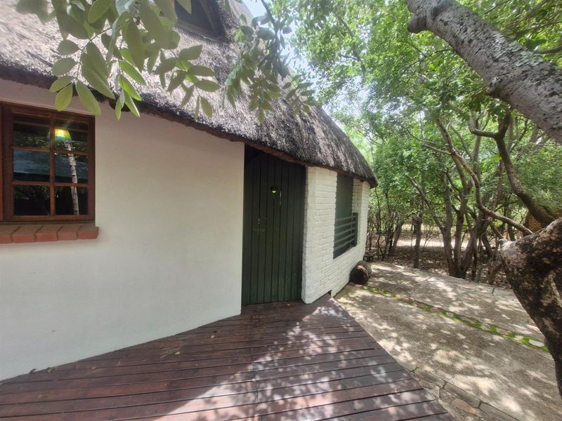 Distinctive Thatch-Home Offering Space - Photo 3