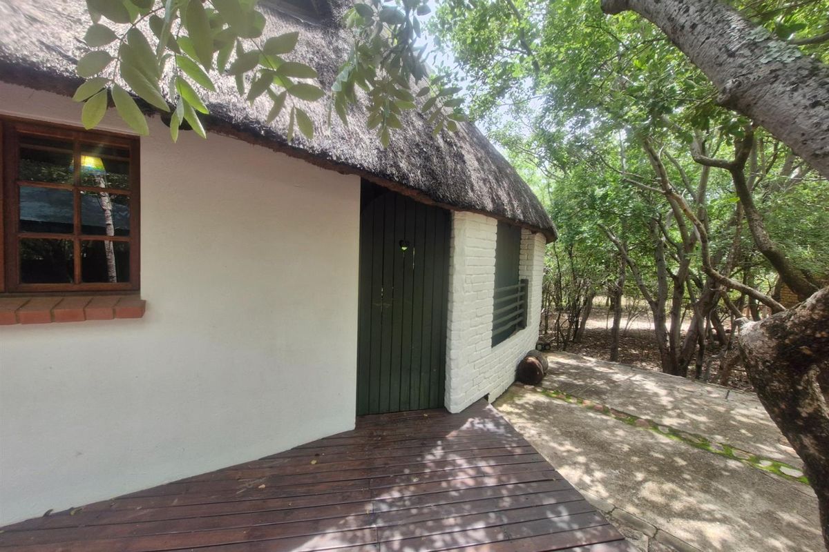 Distinctive Thatch-Home Offering Space - Photo 3