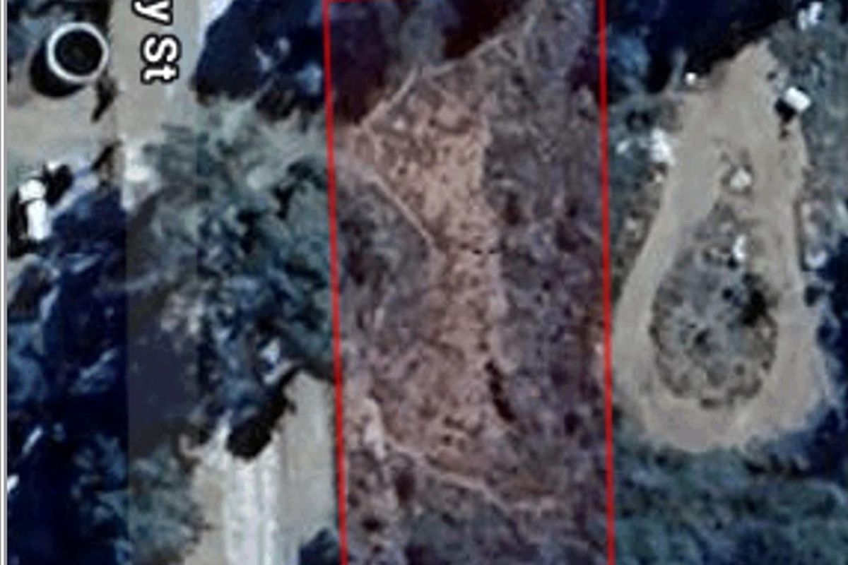 An aerial view showing the boundaries of the vacant residential land plot located near Grey Street.