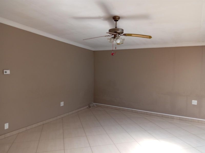 Elegant 4-Bedroom Home with Income-Generating Flat in Sought after Ext 14, Bethal - Photo 10
