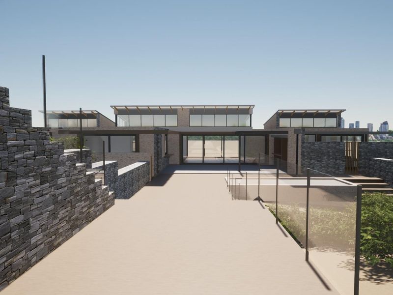 A modern architectural rendering of a rear exterior facade featuring stone cladding, expansive glass windows, and a tiered paved terrace area.