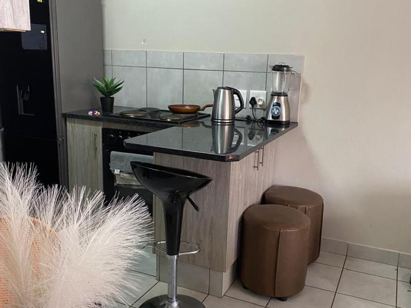 TWO BEDROOM APARTMENT WITH SOLAR BACK-UP - Photo 9