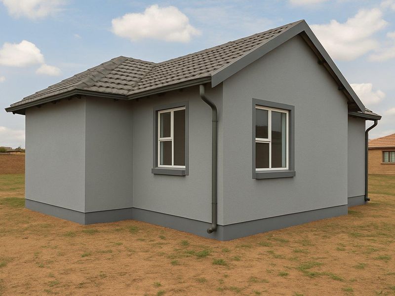 A view of the rear exterior of a modern house featuring grey rendered walls, tiled roof, and white-framed windows.