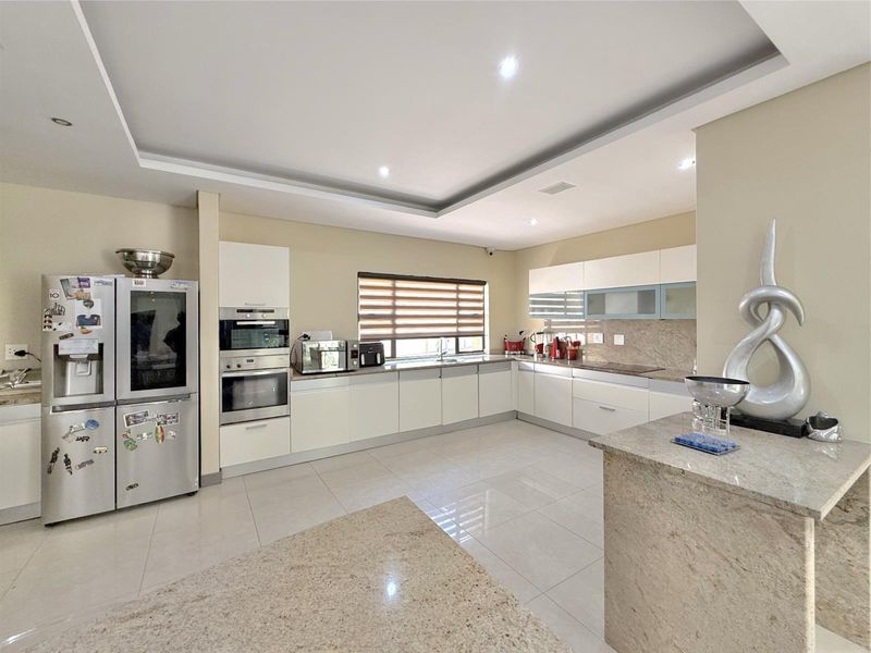 Refined Elegance and Contemporary Luxury on a Prime Corner Stand - Photo 7