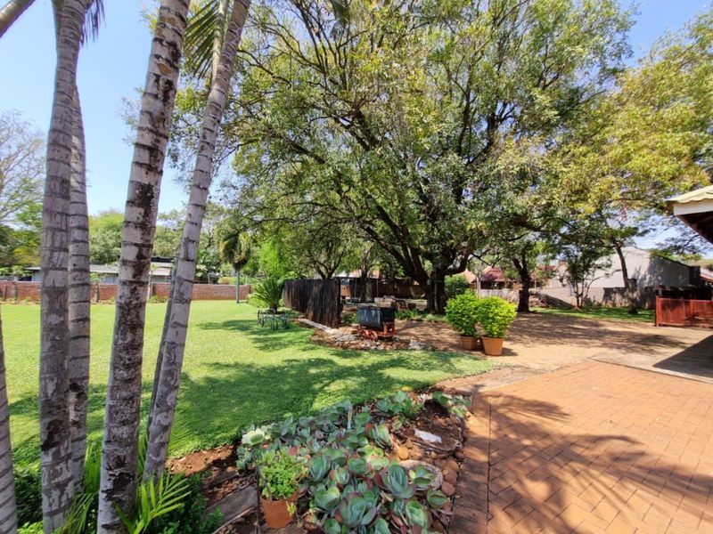 Immaculate Modern Home on Double Stand | Entertainer’s Dream with Pool & Lush Garden - Photo 3