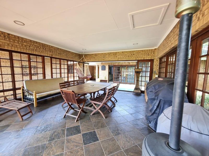 Immaculate Modern Home on Double Stand | Entertainer’s Dream with Pool & Lush Garden - Photo 5