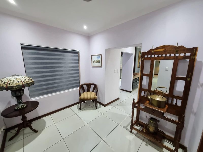 Immaculate Modern Home on Double Stand | Entertainer’s Dream with Pool & Lush Garden - Photo 10