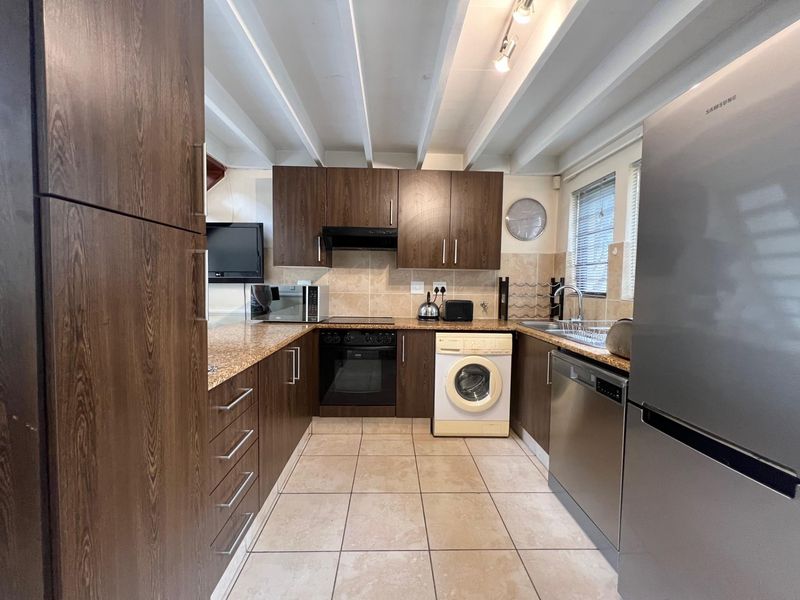 Fully Furnished 2-Bedroom Townhouse in Sought After Lifestyle Estate - Photo 4
