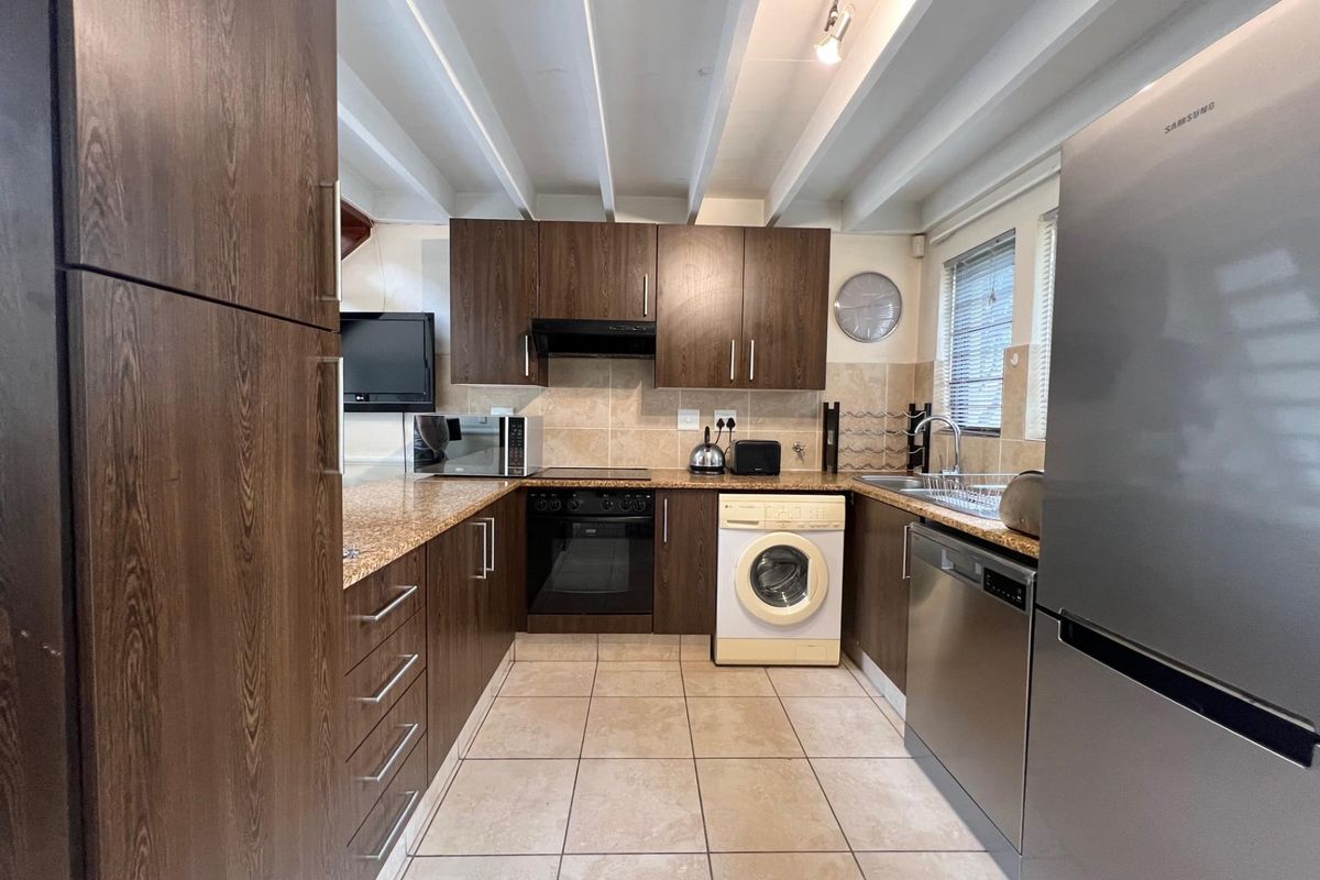 Fully Furnished 2-Bedroom Townhouse in Sought After Lifestyle Estate - Photo 4