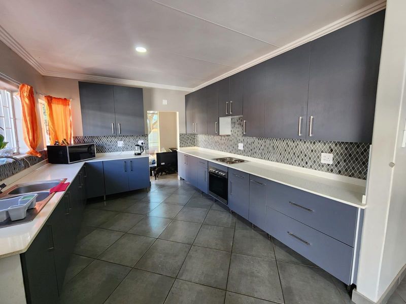 Neat Renovated Freestanding 3 Bedroom Home with 1 Bedroom Flat ,with big yard for sale. - Photo 1