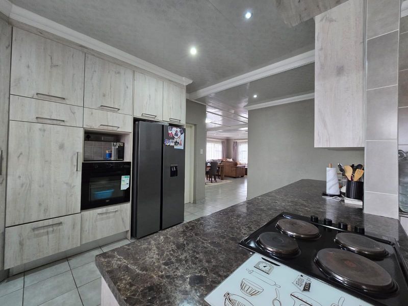 Where Modern Living Meets Family Comfort - A Home to Fall in Love With! - Photo 9