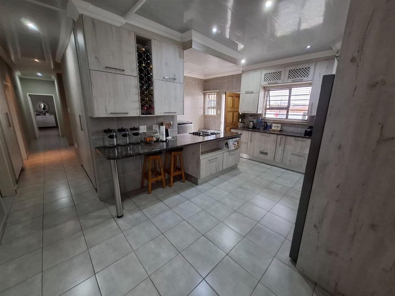 Where Modern Living Meets Family Comfort - A Home to Fall in Love With! - Photo 8