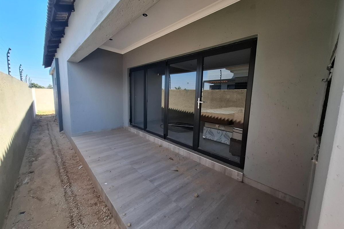 Be the First to Own This Brand-New Modern 4-Bedroom Home Nearing Completion - Photo 3