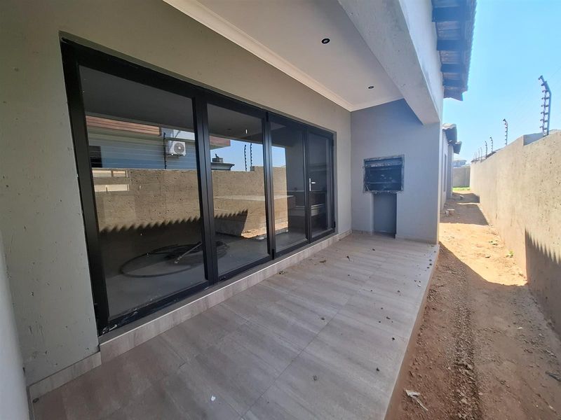 Be the First to Own This Brand-New Modern 4-Bedroom Home Nearing Completion - Photo 2