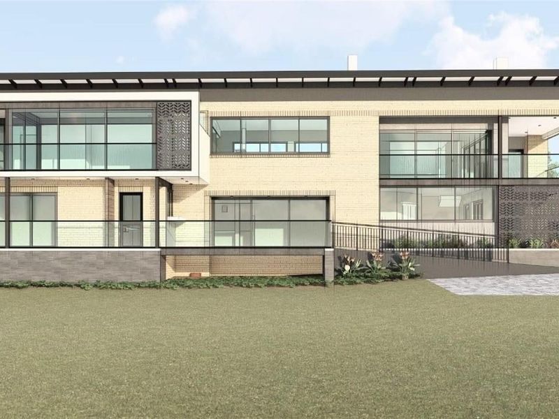 A modern architectural rendering of a two-story residential property featuring expansive glass facades, balconies with glass balustrades, and a clean brick exterior finish.