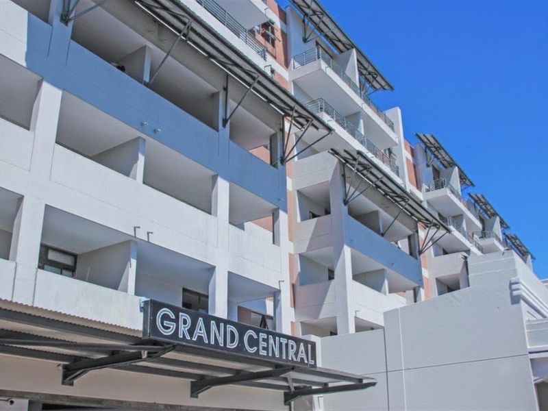 Exterior view of the Grand Central building facade featuring multiple levels of balconies and modern architectural design.