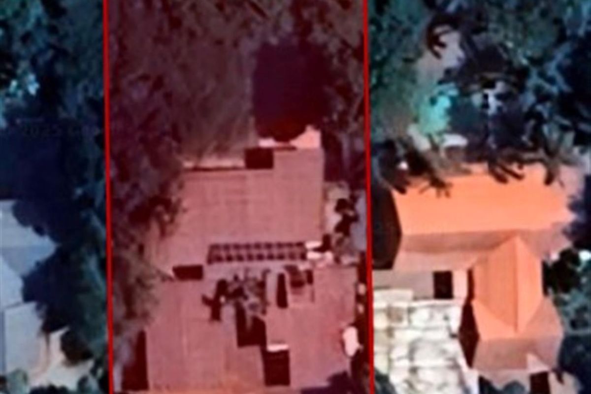 Aerial view of the commercial property site showing the building footprint and surrounding grounds.