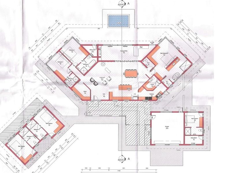 Architectural floor plan detailing the layout of the residential property, including main living areas, bedrooms, kitchen, garage, and staff quarters.
