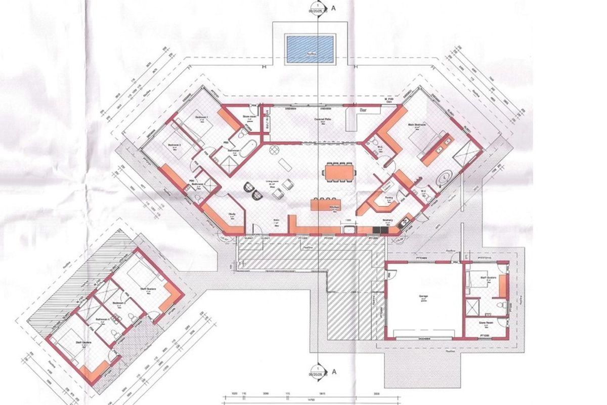 Architectural floor plan detailing the layout of the residential property, including main living areas, bedrooms, kitchen, garage, and staff quarters.