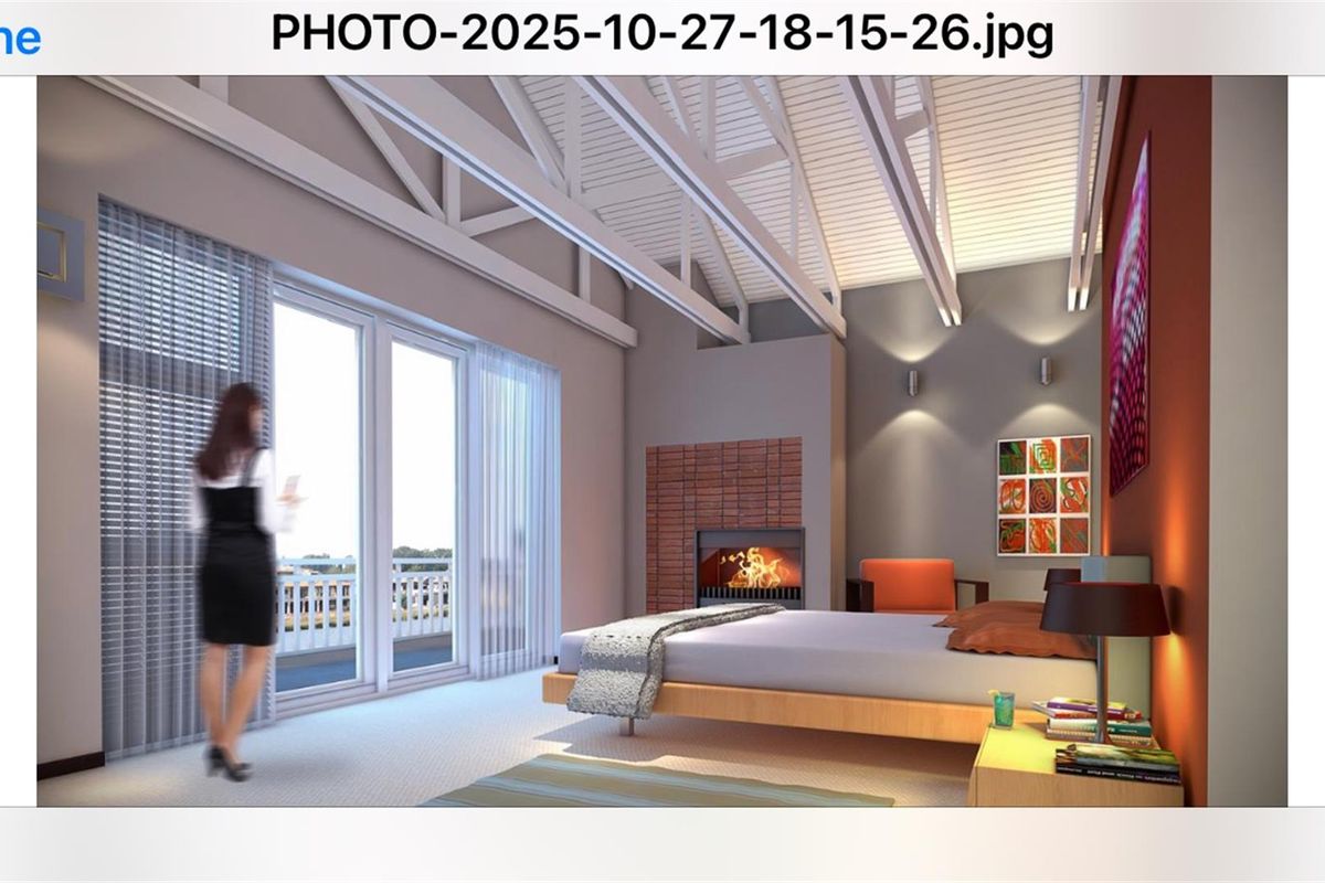 Spacious bedroom featuring a vaulted ceiling with exposed trusses, a built-in fireplace, and large glass sliding doors opening to a balcony.