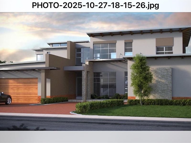 A modern architectural rendering of a residential property featuring a contemporary facade, paved driveway, and integrated garage.